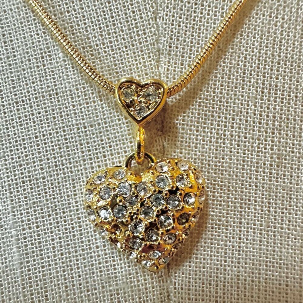 Gold tone heart rhinestone pendant necklace